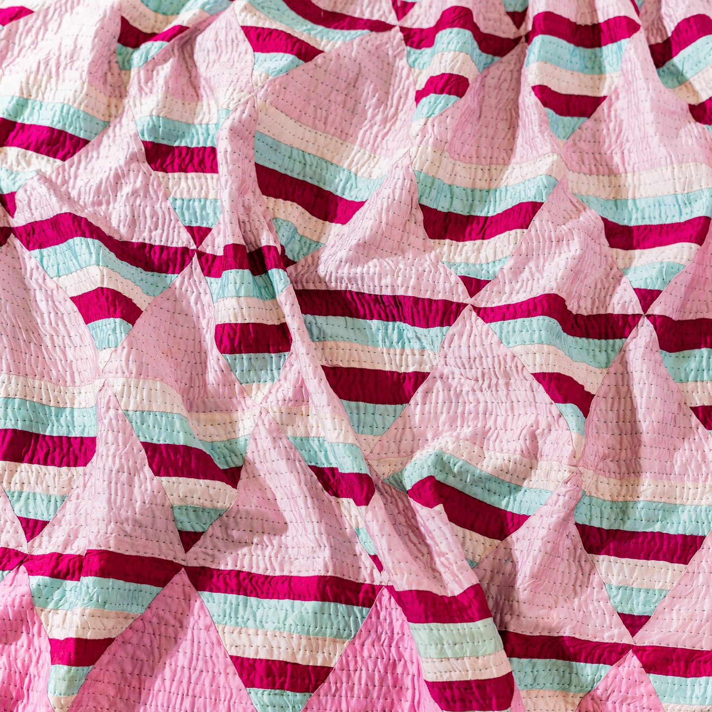 Blush Prism Patchwork Silk Ralli Quilt– Reversible Floral Back Heritage Craft from Sindh